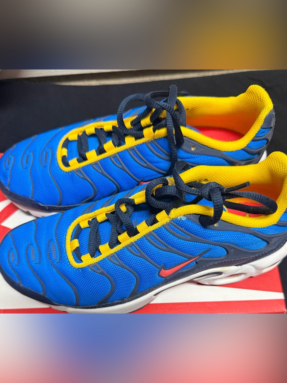 Nike Kids Blue Sneakers with Yellow Trim and Red Swoosh
